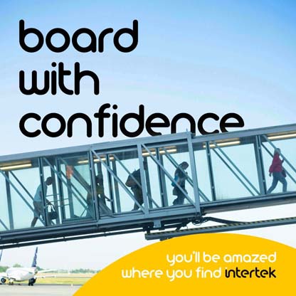 Passengers boarding a plane in a windowed gangway